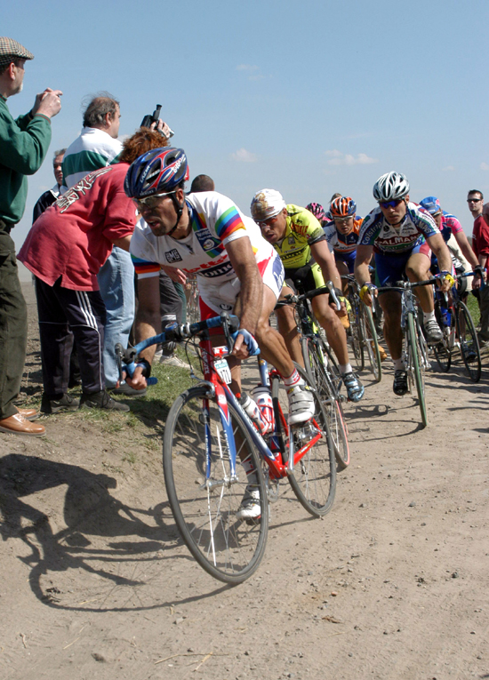 Van Petegem leads over the cobbles