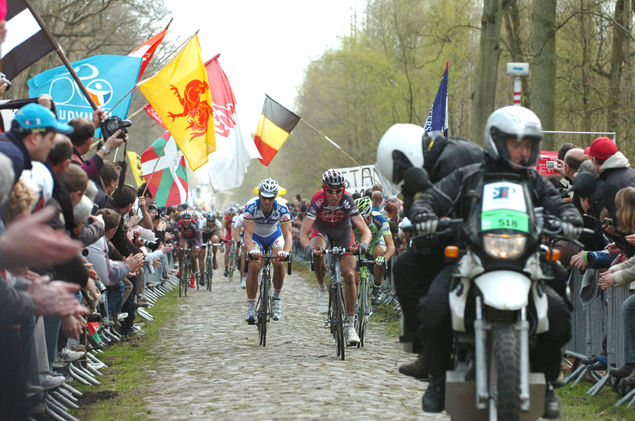 Johan van Summeren leads Tom Boonen in the Arenberg Forest