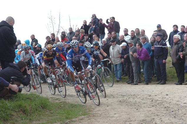 Matteo Tossatto leads Tom Boonen