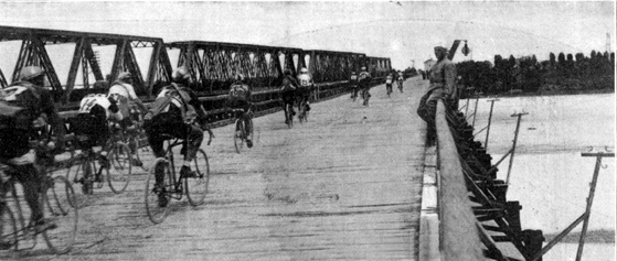 Riders crossing the Piave river